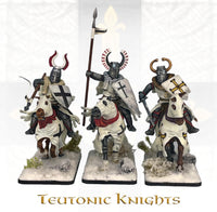 VICTRIX MINIATURES - VXE002 MEDIEVAL AND FANTASY HEADS, CLOAKS AND SHIELDS